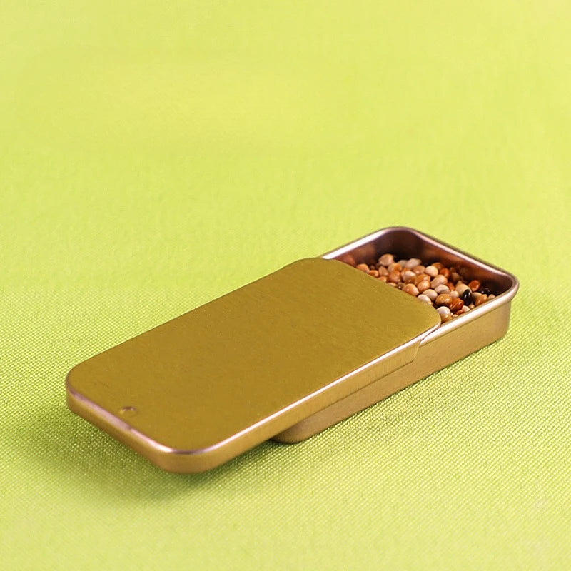 handhållen foderdosa i metall for fågelträning